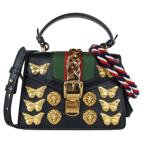 Sylvie animal studs leather mini bag 